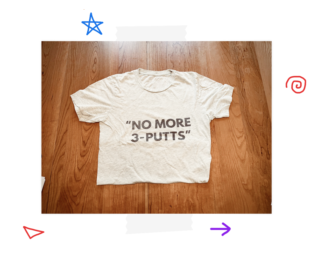 A light blue shirt with NO MORE 3 PUTTS in all caps